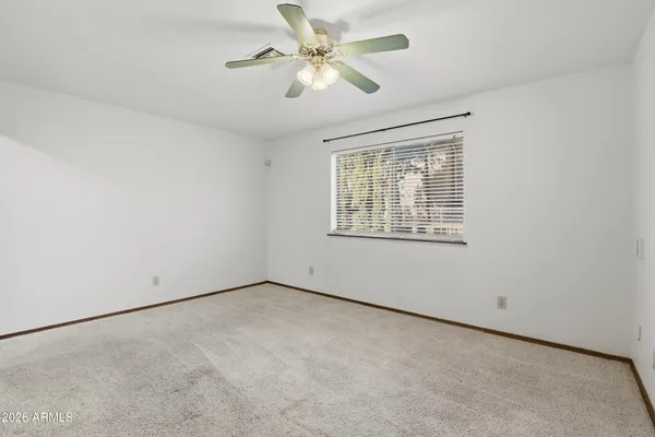 an empty room with a bathroom