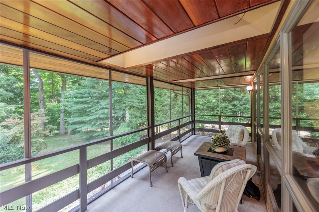 425 Bittersweet Road Akron, OH 44333 - Photo 17 of 50 Sunroom / solarium featuring plenty of natural light and wood ceiling