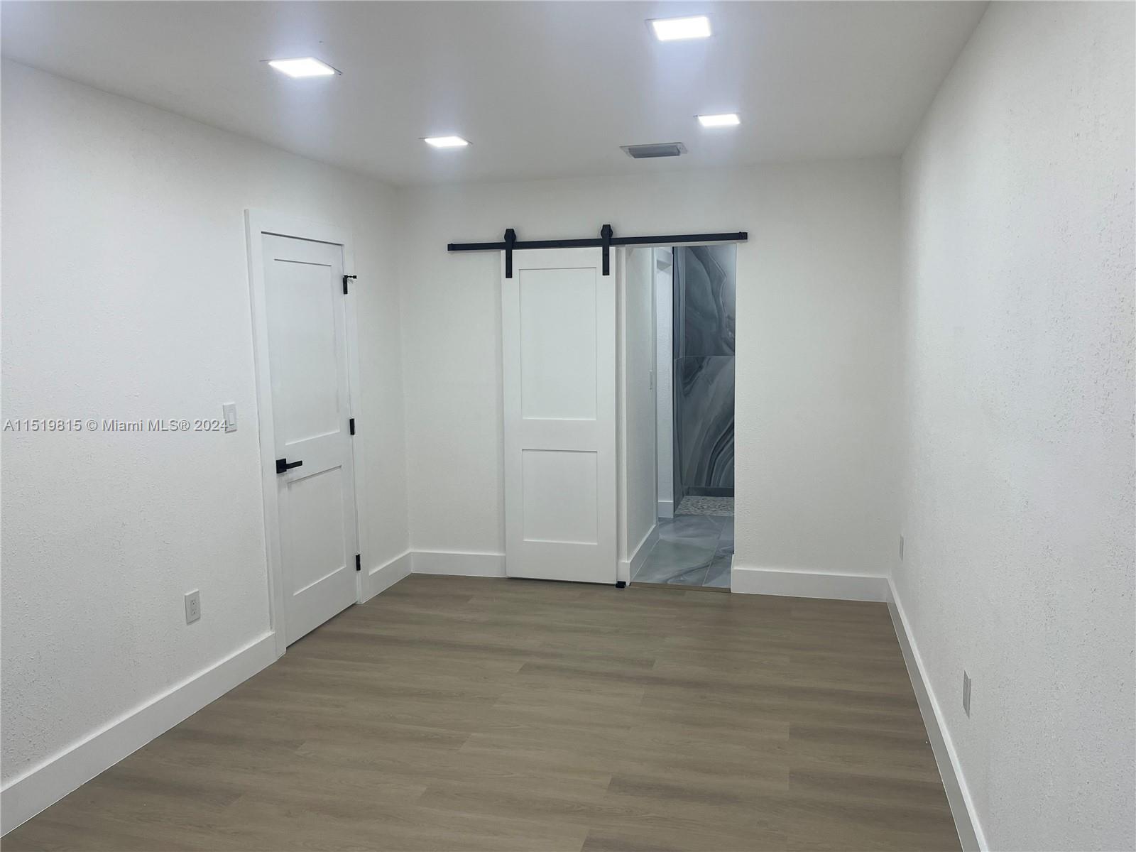 10420 Southwest 42nd Street Miami, FL 33165 - Photo 7 of 17 a view of an empty room