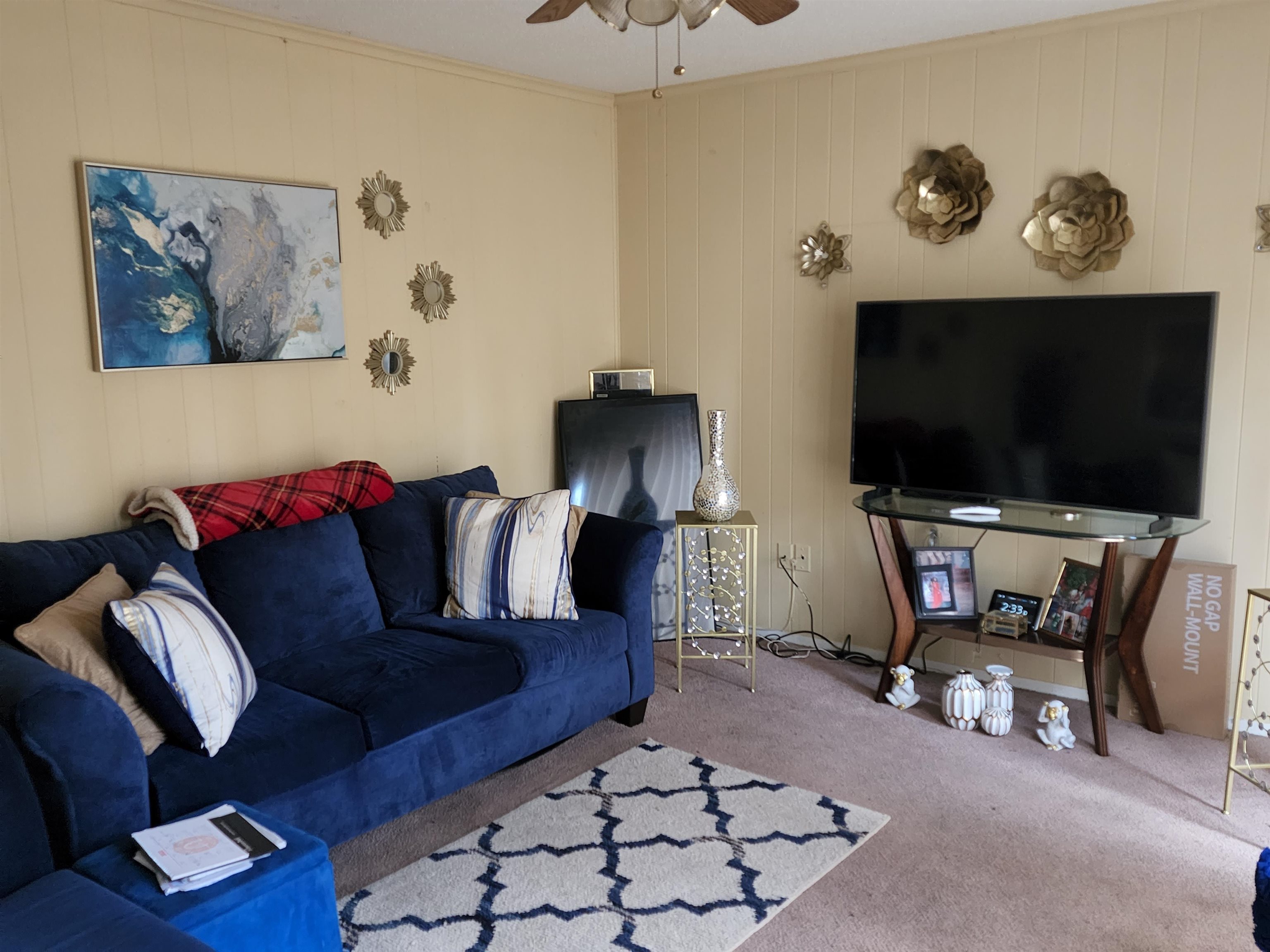 1694 Winfield Road Memphis, TN 38116 - Photo 7 of 19 a living room with furniture and a flat screen tv