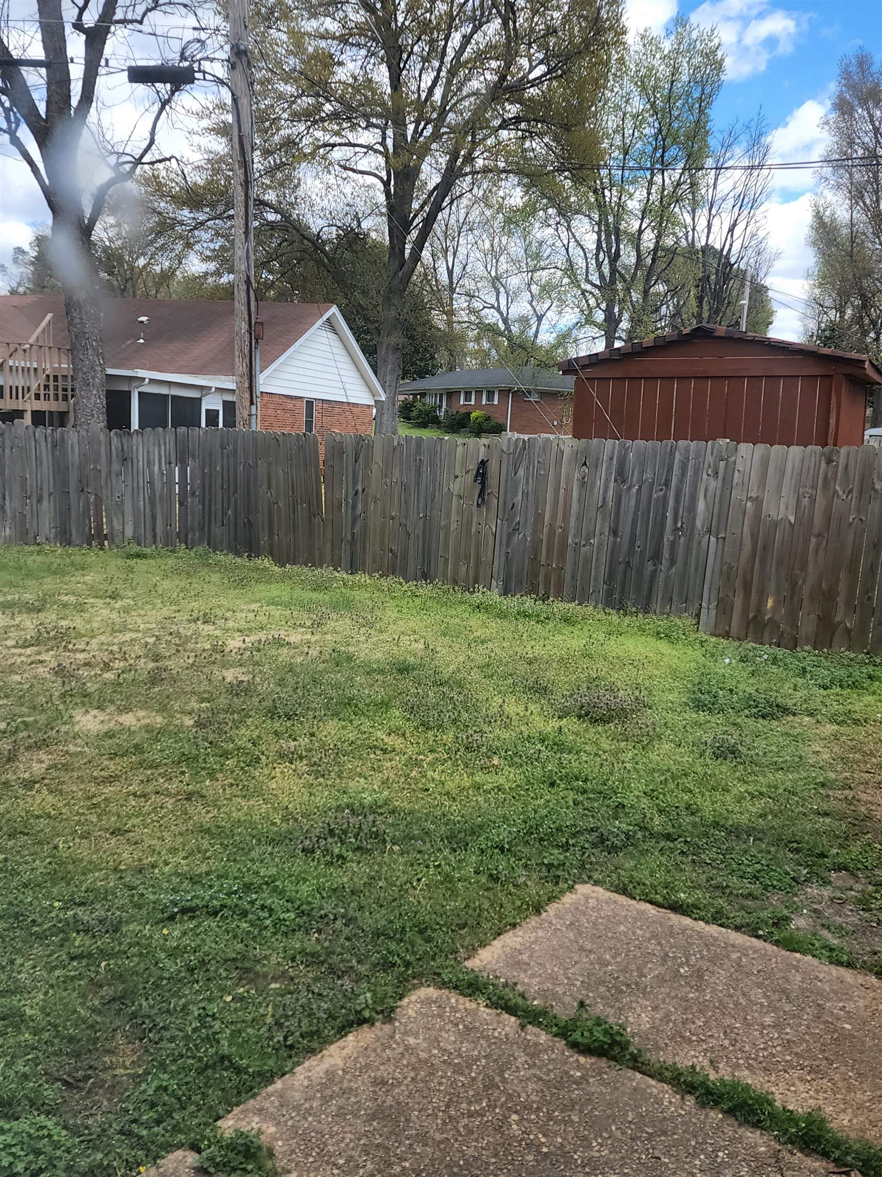 1694 Winfield Road Memphis, TN 38116 - Photo 8 of 19 a backyard of a house
