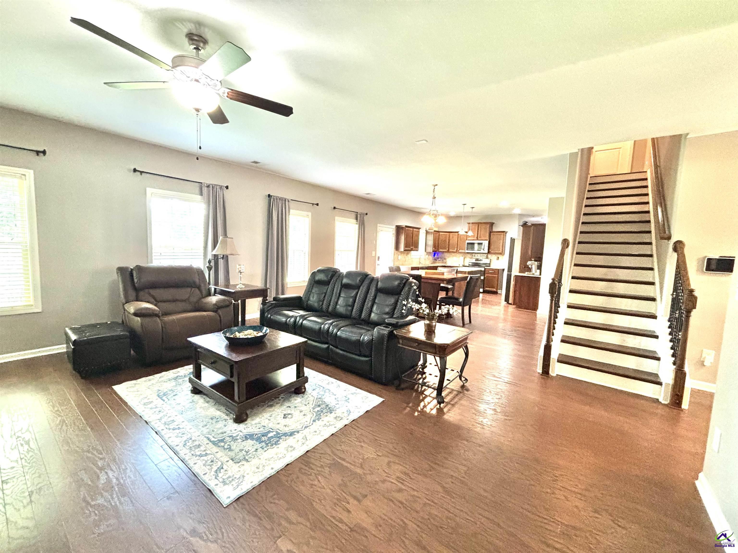 600 Post Oak Way Warner Robins, GA 31088 - Photo 15 of 50 a living room with furniture or wooden floor and a large window