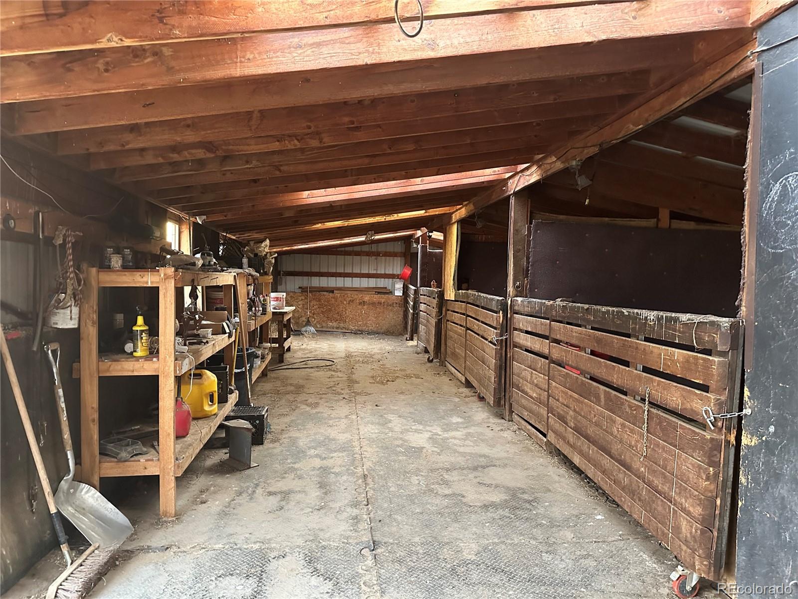 1080 South Dutch Valley Road Bennett, CO 80102 - Photo 17 of 18 a view of a room with gym equipment