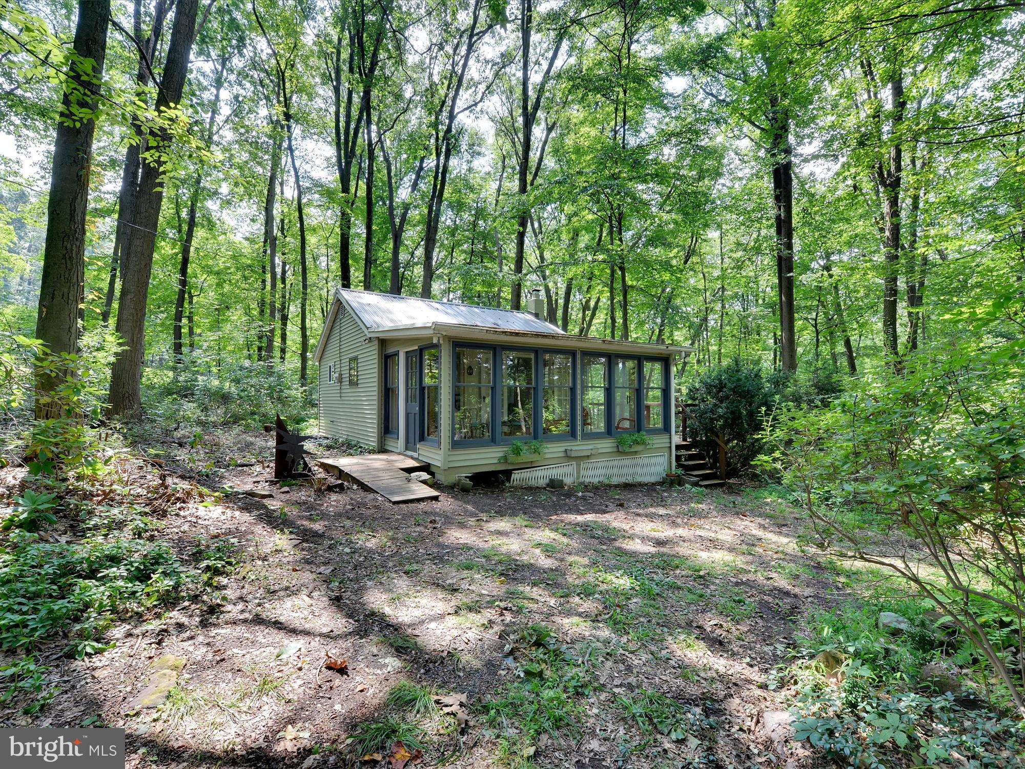 540 Hill Road Denver, PA 17517 - Photo 1 of 25 a view of a house with a yard