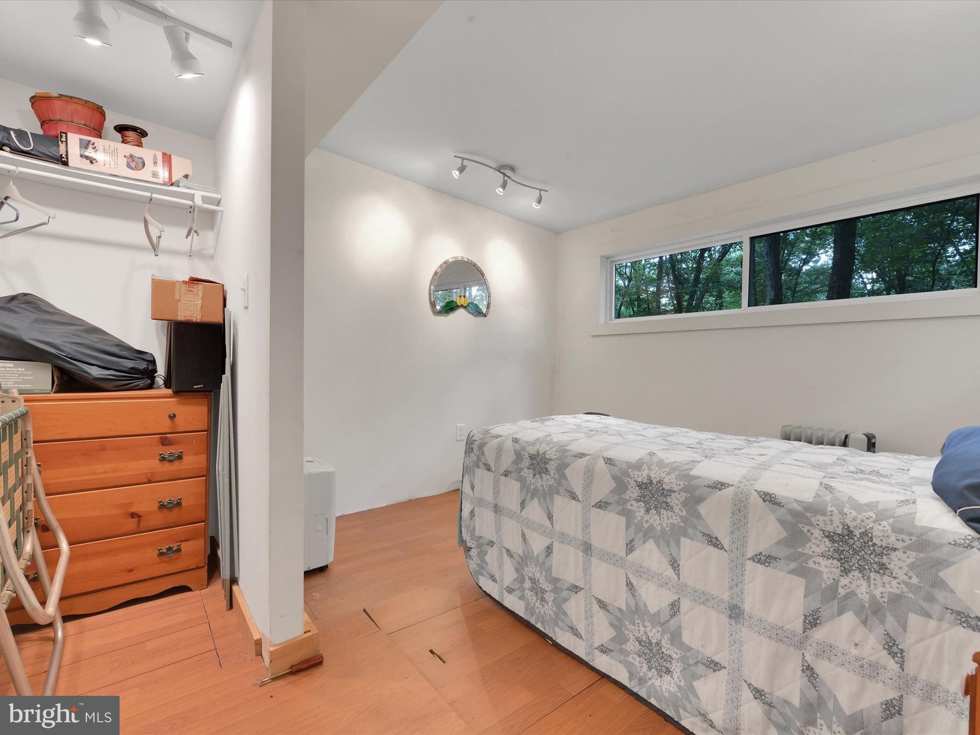 540 Hill Road Denver, PA 17517 - Photo 11 of 25 a bedroom with a bed and a window