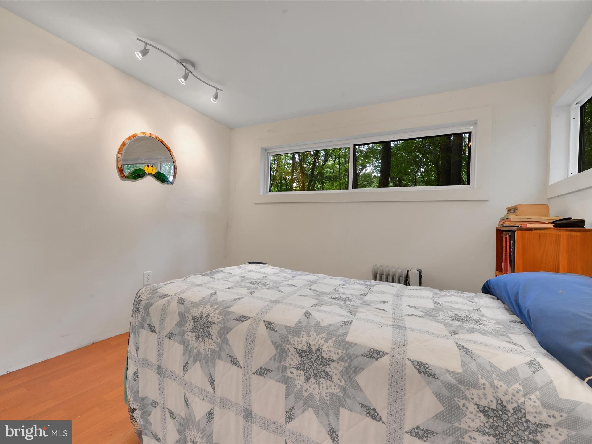 540 Hill Road Denver, PA 17517 - Photo 12 of 25 a bedroom with a bed and a window