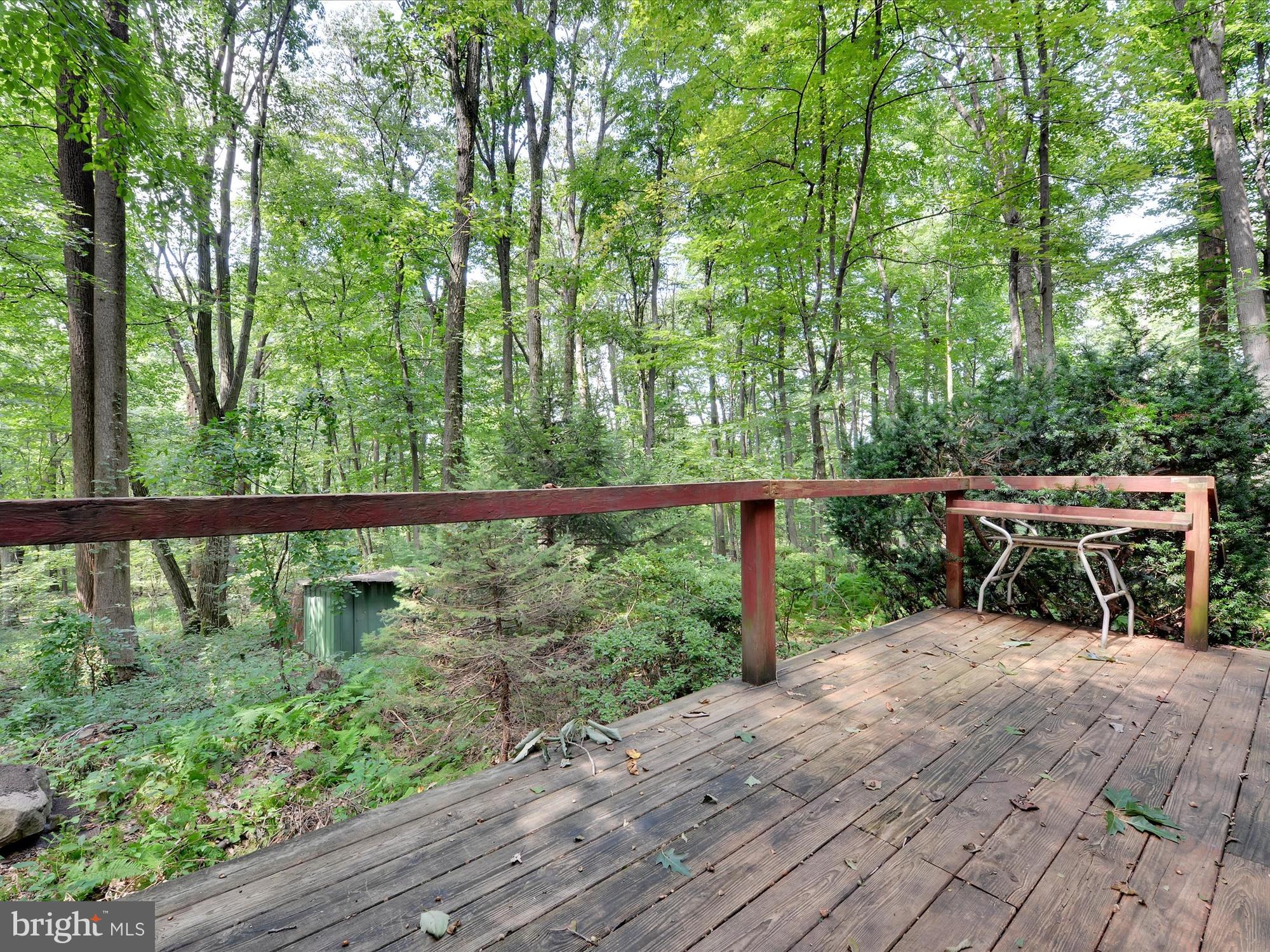 540 Hill Road Denver, PA 17517 - Photo 15 of 25 a balcony with trees in front of it