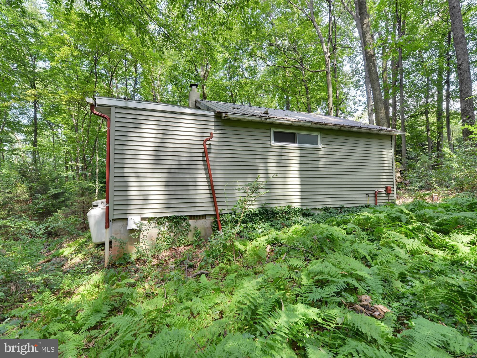 540 Hill Road Denver, PA 17517 - Photo 18 of 25 a view of a house that has a large window