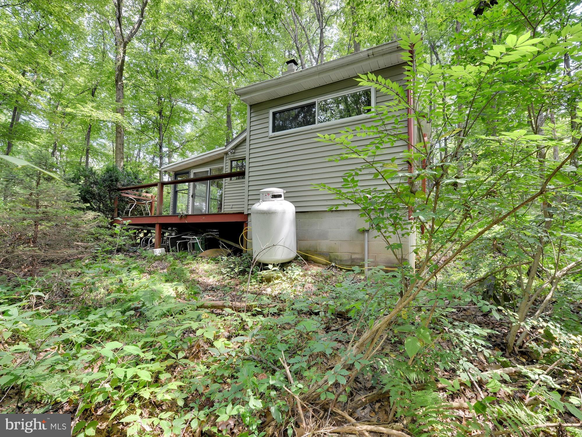540 Hill Road Denver, PA 17517 - Photo 19 of 25 a backyard of a house with outdoor seating