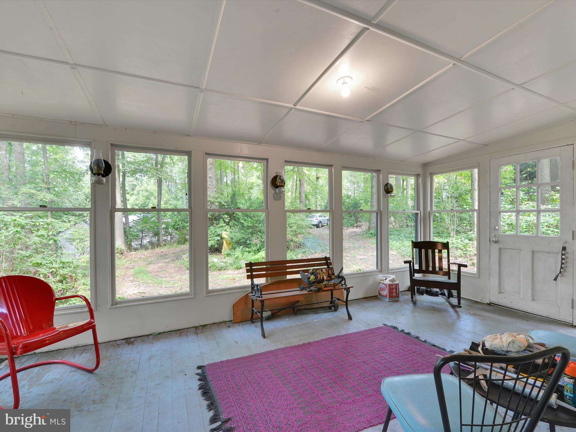 540 Hill Road Denver, PA 17517 - Photo 4 of 25 a living room with furniture and a large window