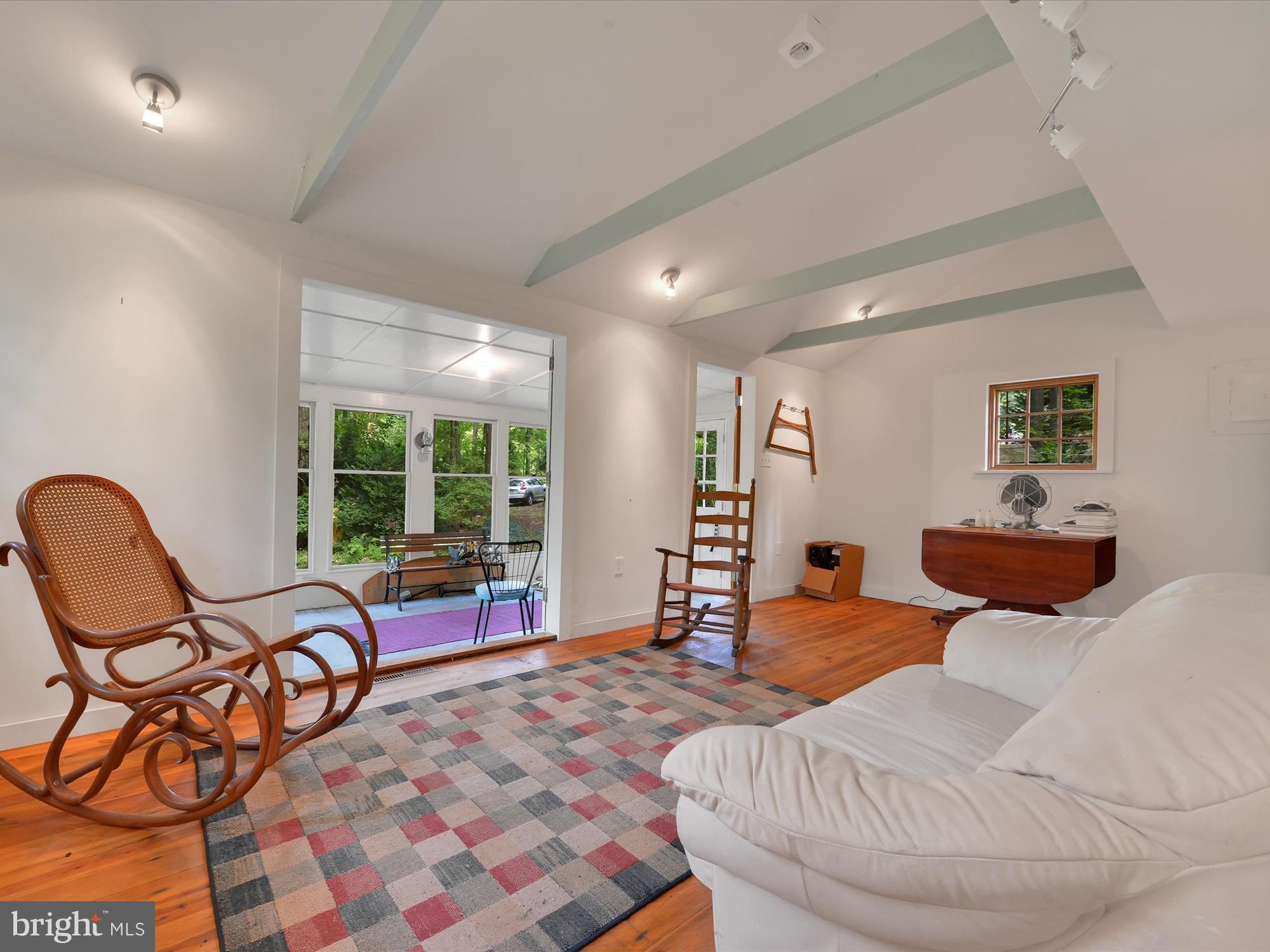 540 Hill Road Denver, PA 17517 - Photo 6 of 25 a living room with furniture and a large window