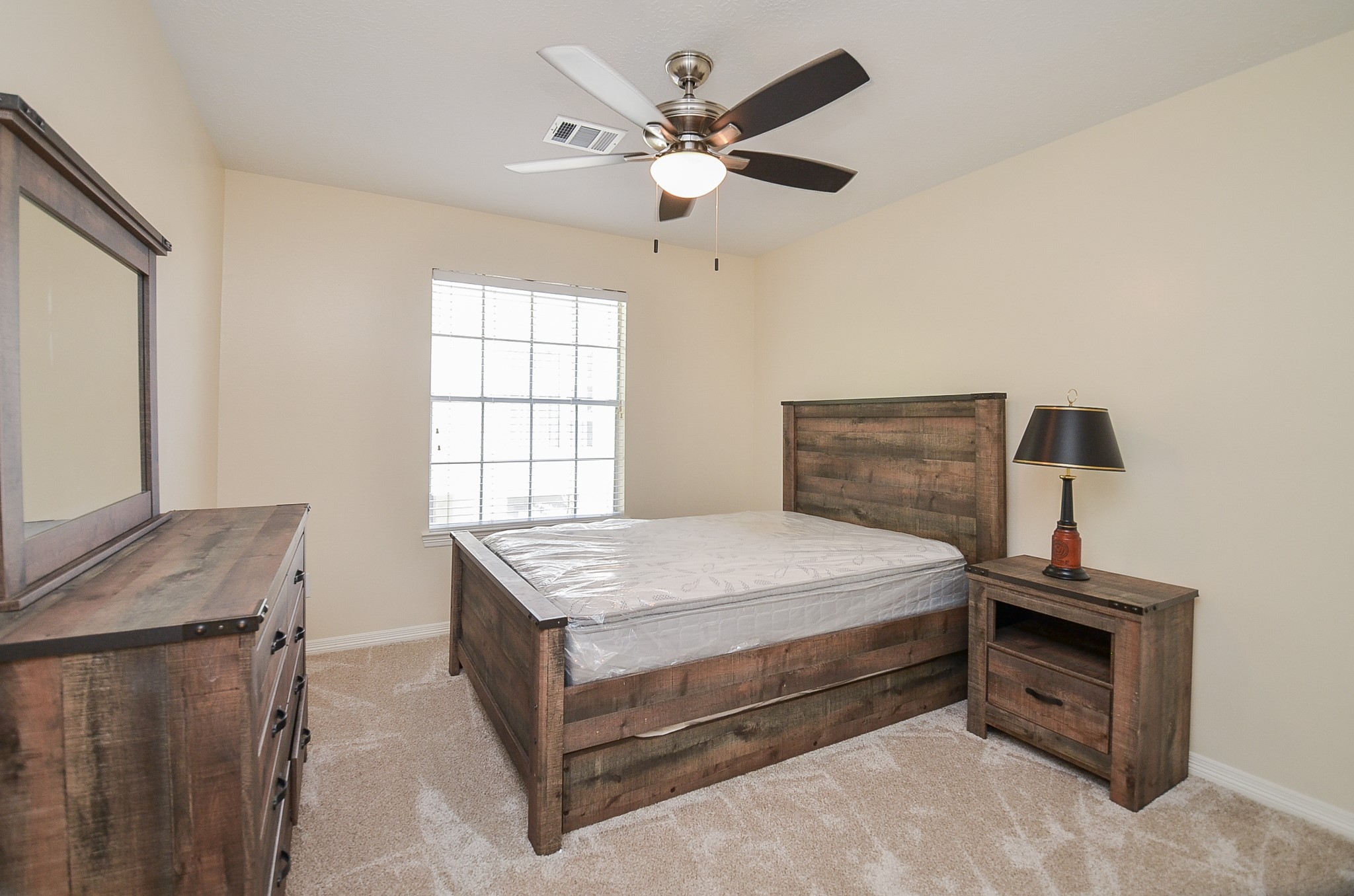 4916 Inker Street Houston, TX 77007 - Photo 26 of 36 Second of the secondary bedrooms, also with carpet, ceiling fan and...