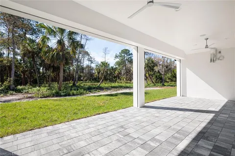 a view of swimming pool with a yard