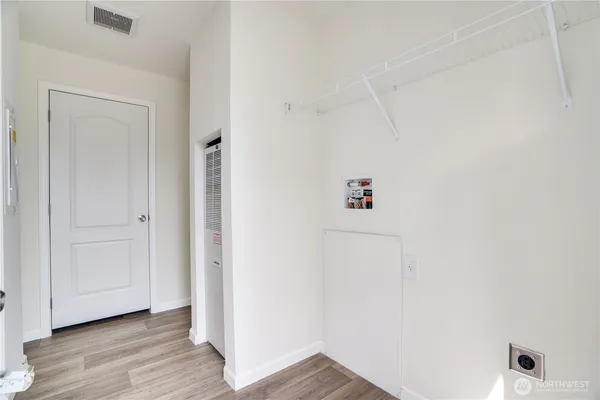 a bathroom with a granite countertop sink a toilet and a bathtub