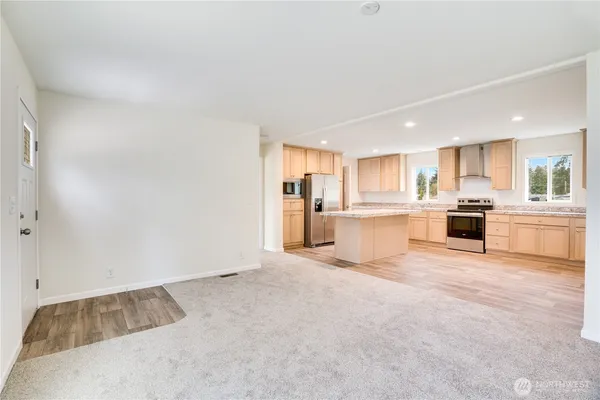a view of a kitchen with a sink
