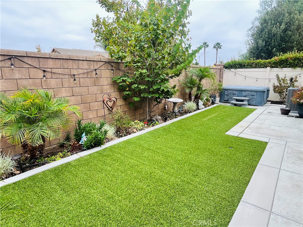 29653 Rigging Way Menifee, CA 92584 - Photo 11 of 11 a backyard of a house with lots of green space
