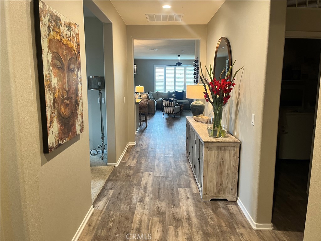 29653 Rigging Way Menifee, CA 92584 - Photo 4 of 11 a view of a living room and bathroom
