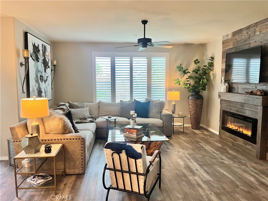 29653 Rigging Way Menifee, CA 92584 - Photo 8 of 11 a living room with furniture and a fireplace