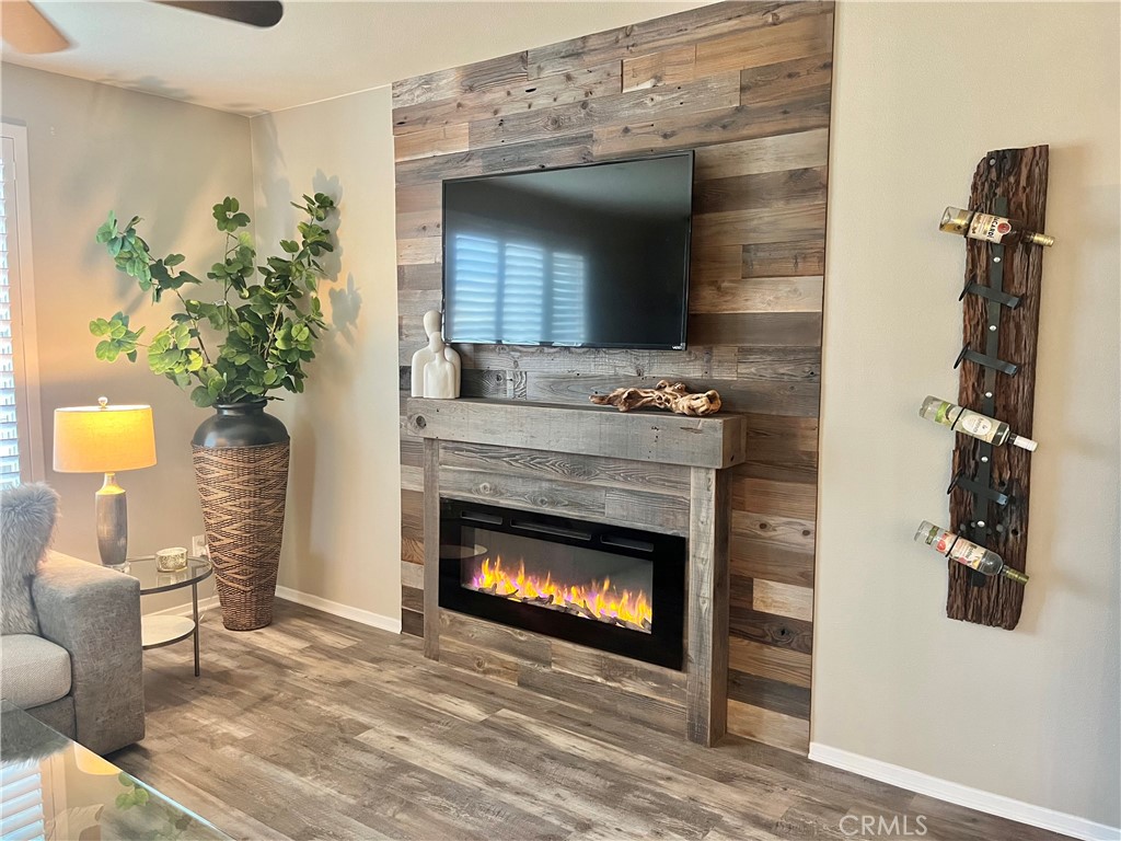 29653 Rigging Way Menifee, CA 92584 - Photo 9 of 11 a living room with furniture and a fireplace