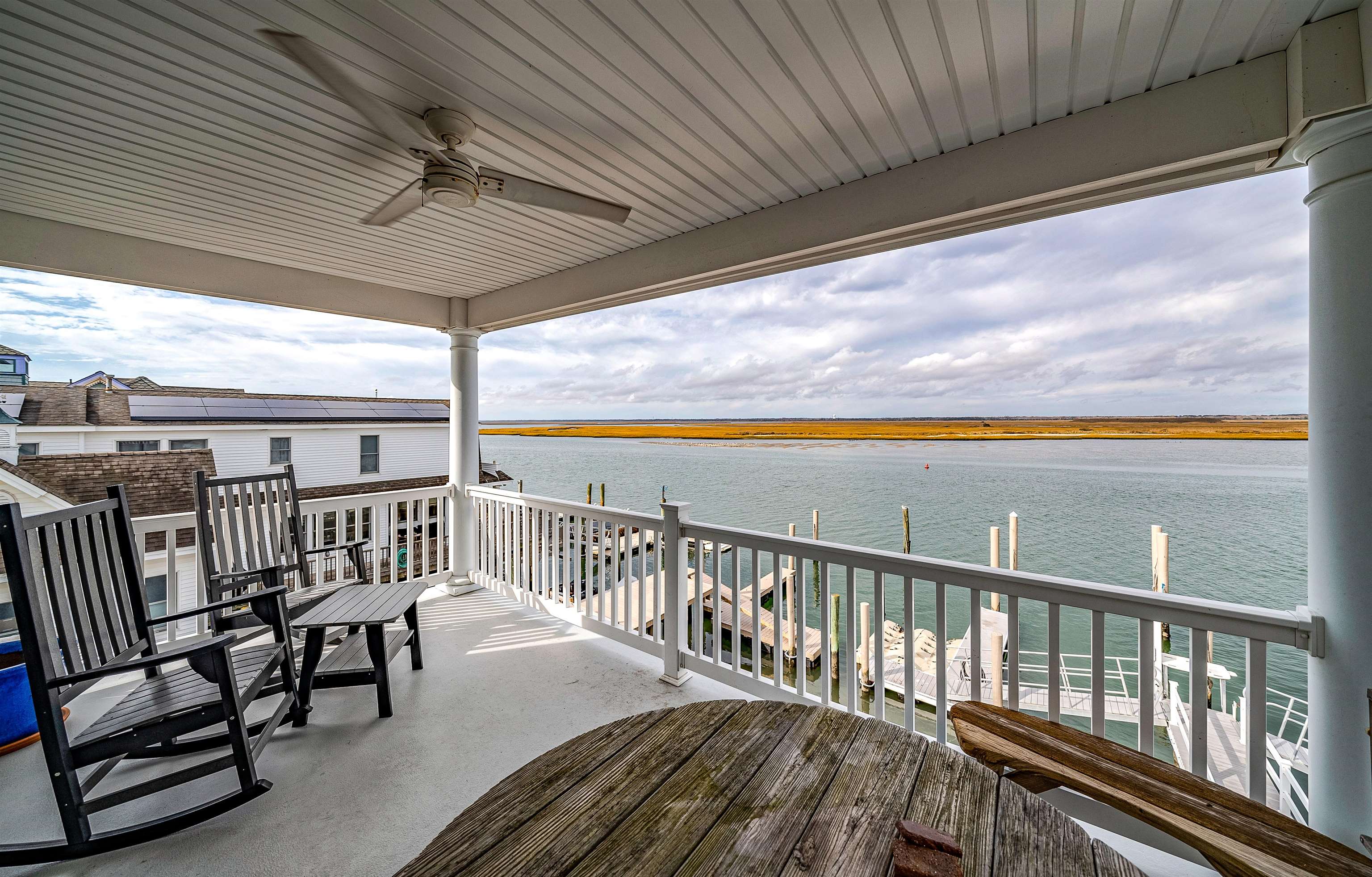 204 South Bayview, Unit SOUTH Strathmere, NJ 08248 - Photo 14 of 21 a view of a balcony with furniture