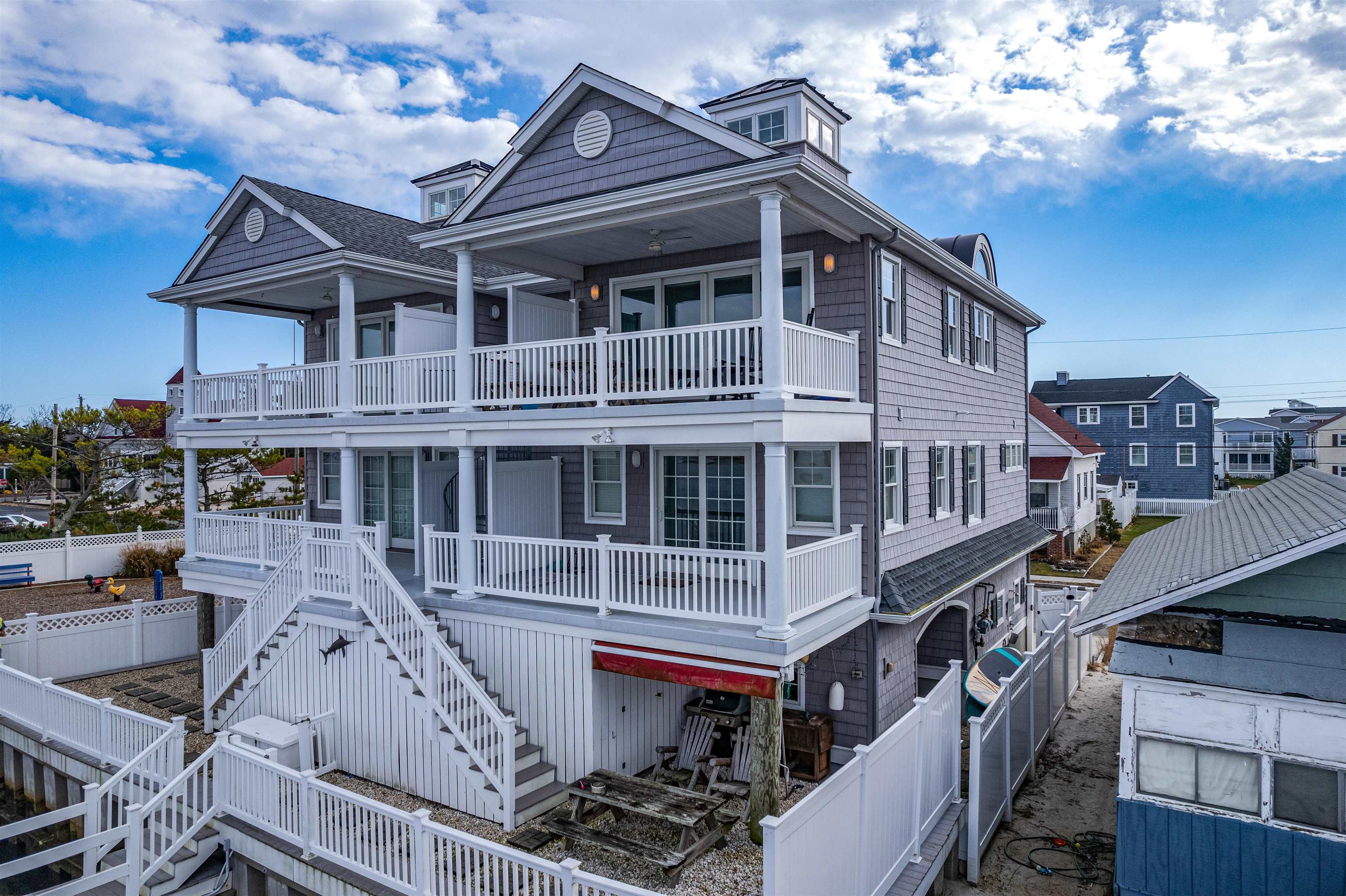 204 South Bayview, Unit SOUTH Strathmere, NJ 08248 - Photo 17 of 21 a front view of a house with balcony