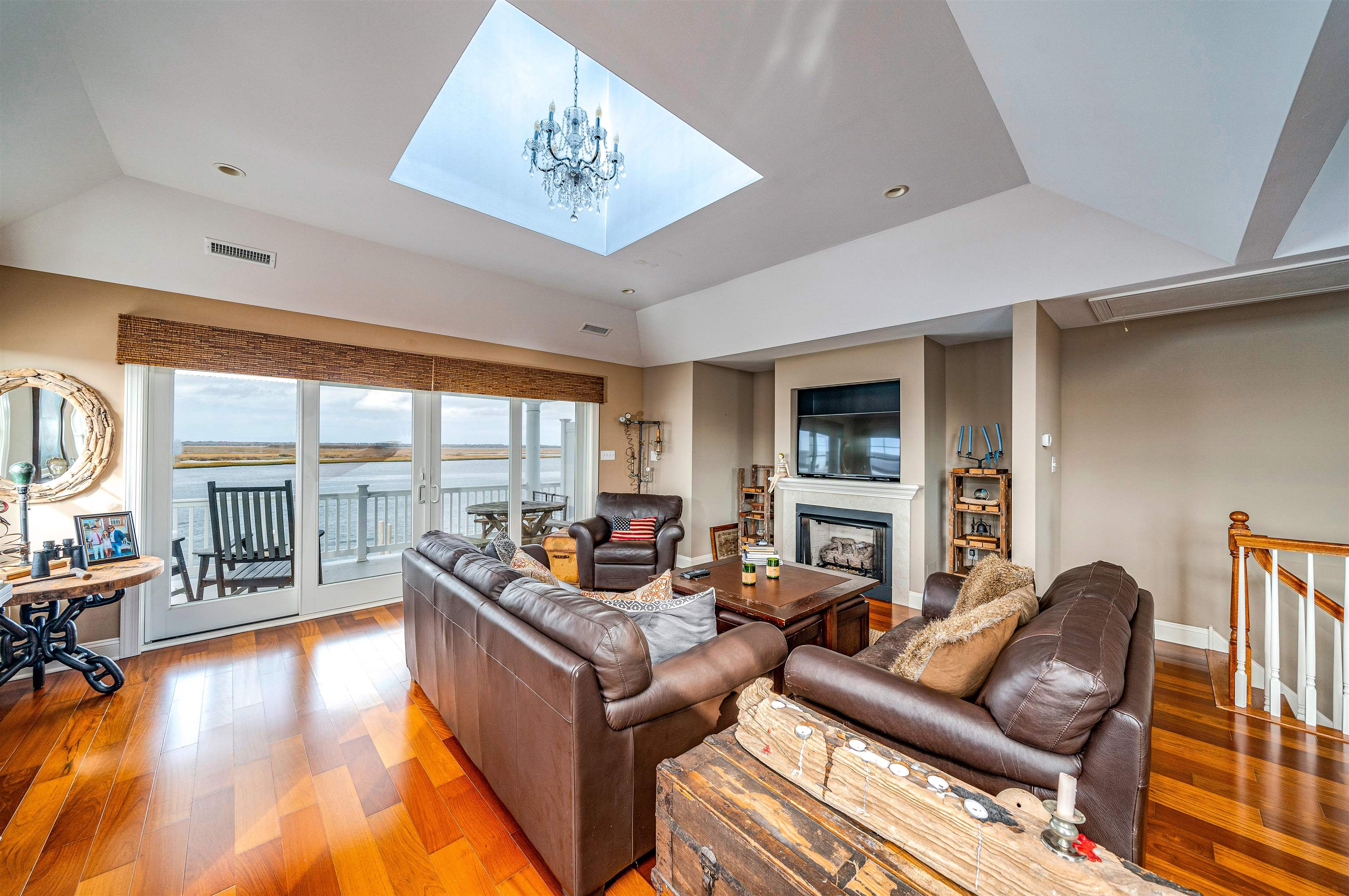 204 South Bayview, Unit SOUTH Strathmere, NJ 08248 - Photo 3 of 21 a living room with furniture and a large window