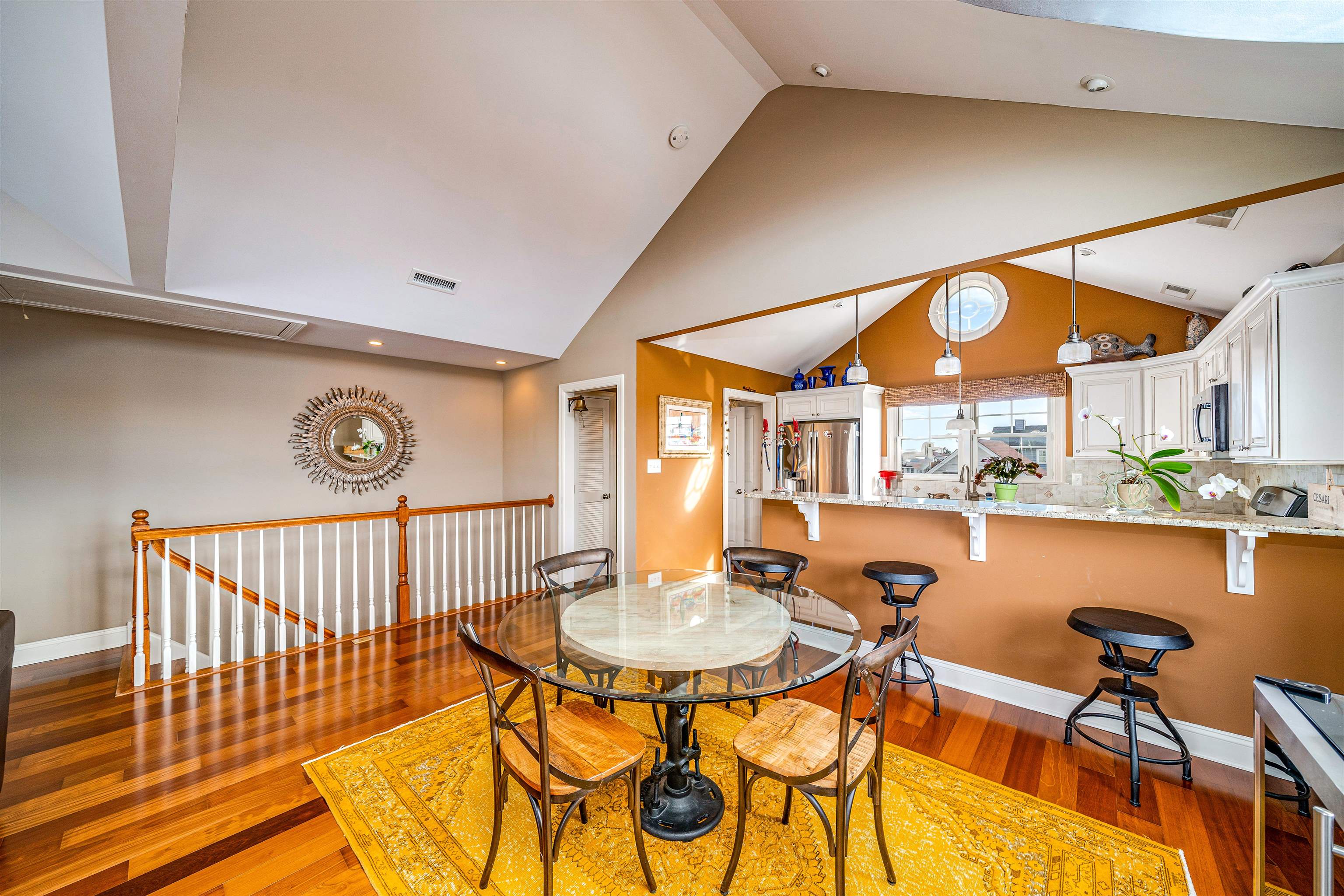 204 South Bayview, Unit SOUTH Strathmere, NJ 08248 - Photo 5 of 21 a view of a dining room with furniture and a window