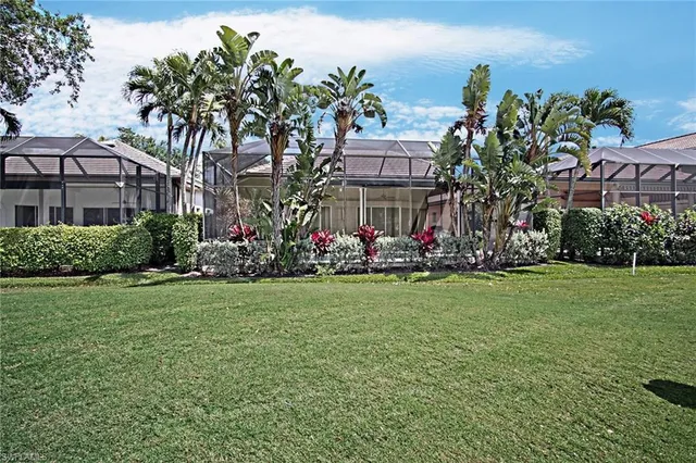 a view of a golf course with a lake