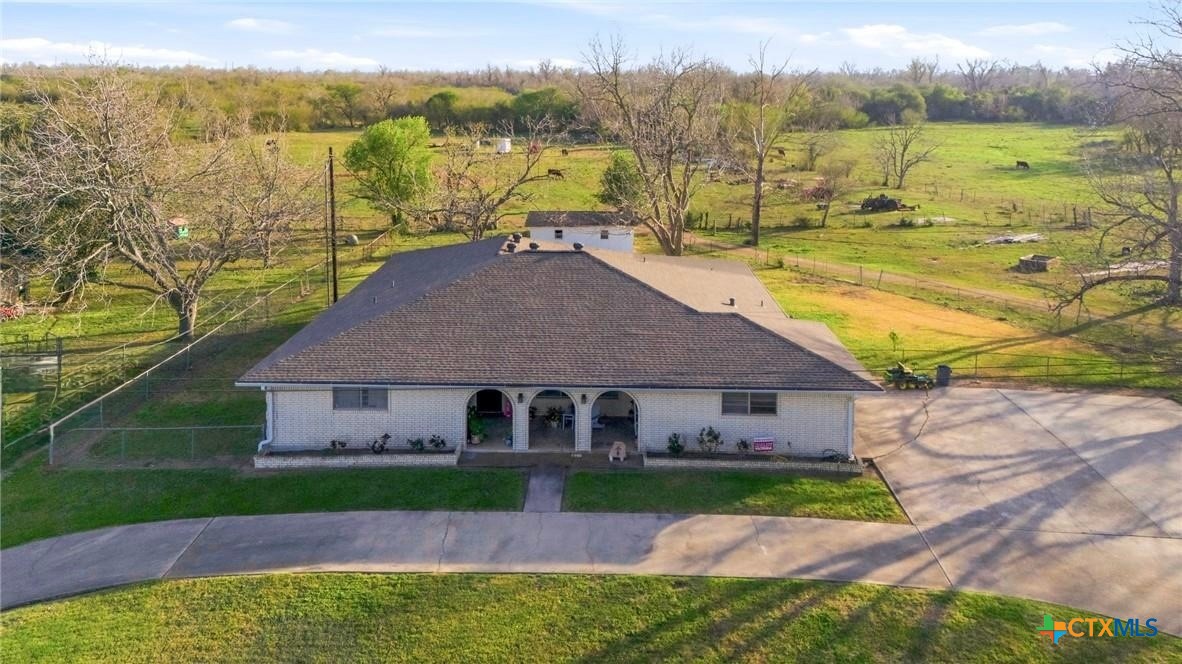 911 West Constitution Street Victoria, TX 77901 - Photo 1 of 42 a aerial view of a house with a yard