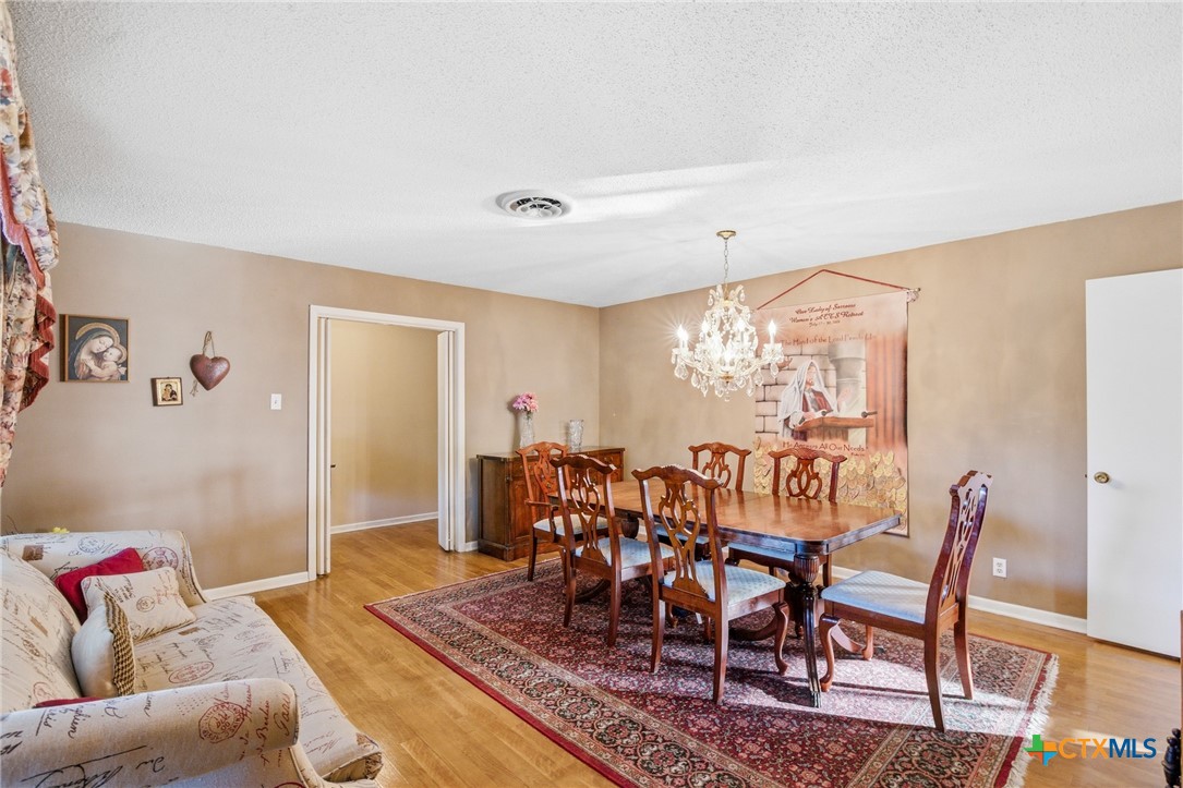 911 West Constitution Street Victoria, TX 77901 - Photo 11 of 42 a view of a livingroom and dining room