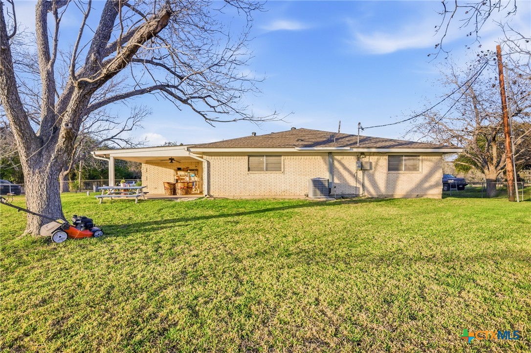 911 West Constitution Street Victoria, TX 77901 - Photo 33 of 42 a view of a house with a yard