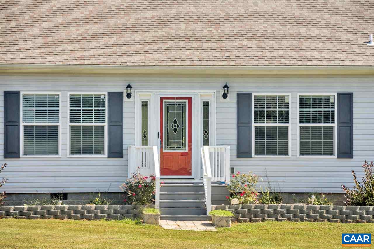 2280 Gold Mine Road Palmyra, VA 22963 - Photo 3 of 42 a front view of a house with swimming pool and porch with furniture
