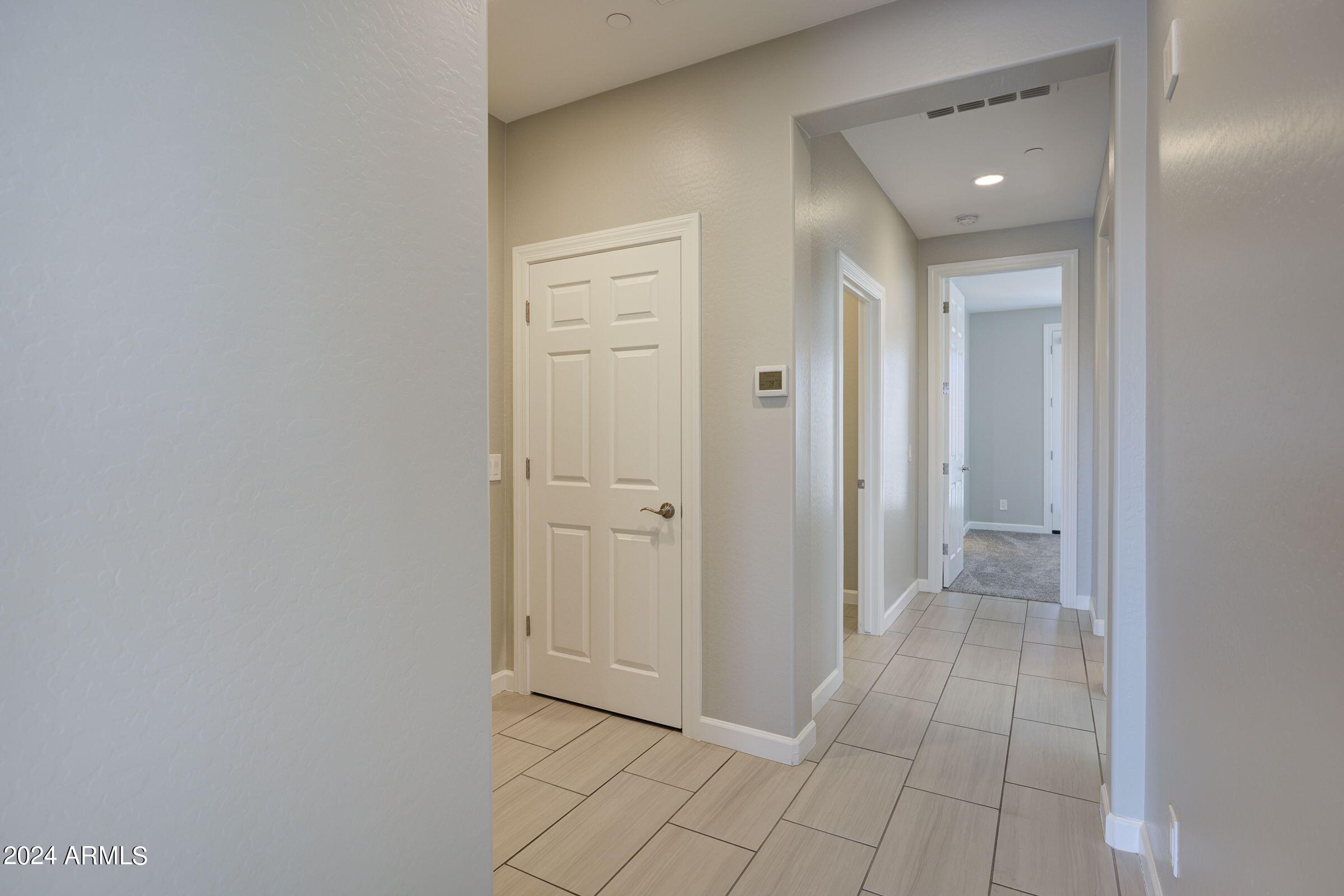 4777 South Fulton Ranch Boulevard, Unit 2066 Chandler, AZ 85248 - Photo 19 of 46 a view of a hallway