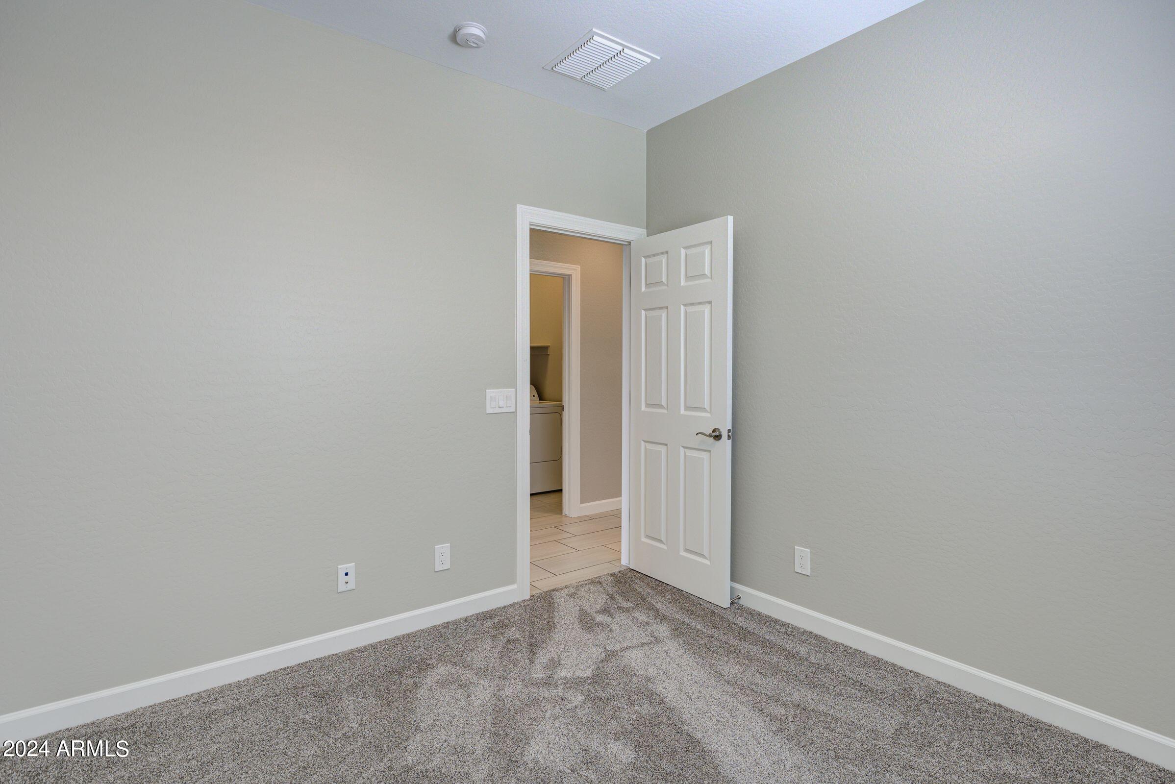 4777 South Fulton Ranch Boulevard, Unit 2066 Chandler, AZ 85248 - Photo 21 of 46 a view of an empty room
