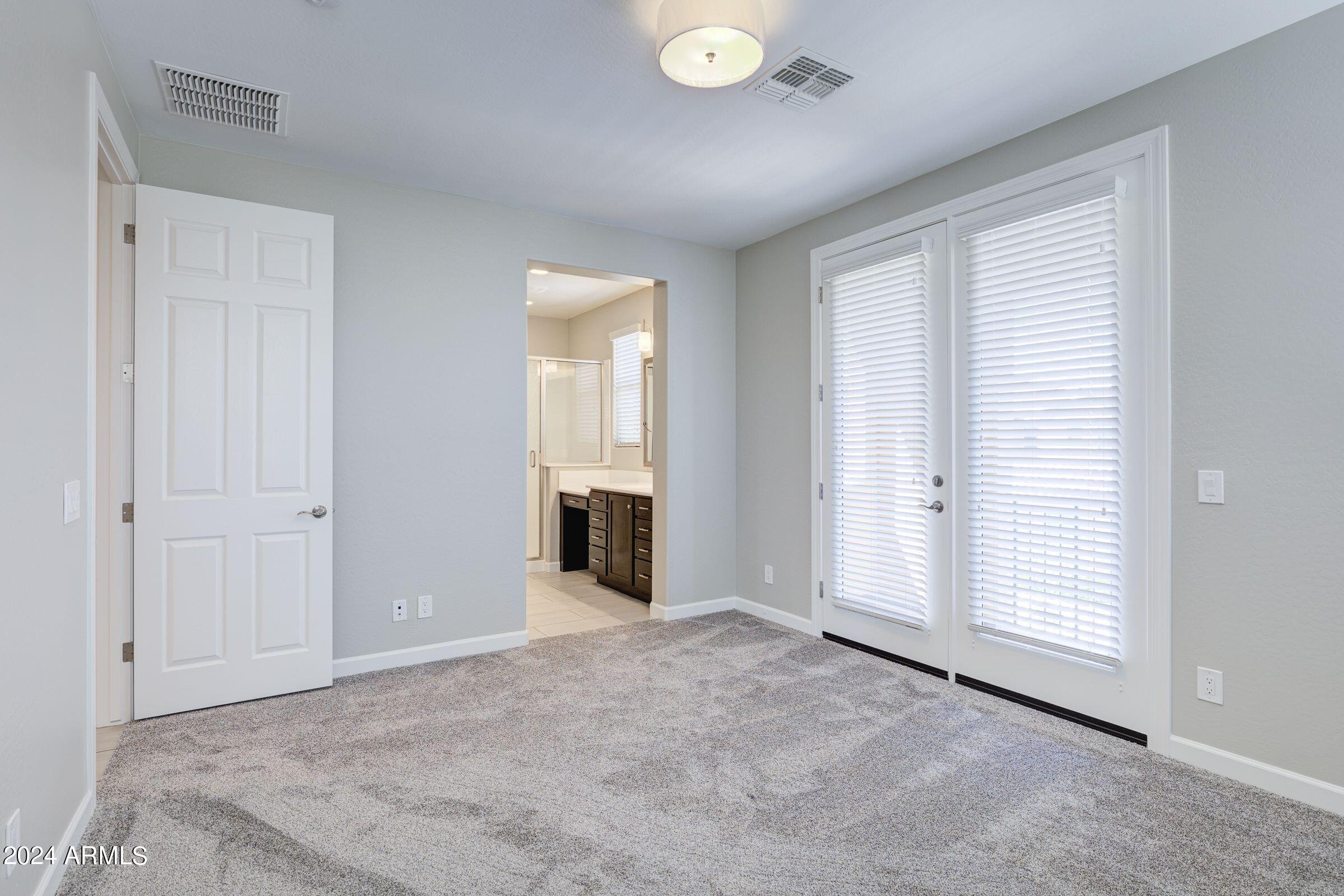 4777 South Fulton Ranch Boulevard, Unit 2066 Chandler, AZ 85248 - Photo 25 of 46 a view of an empty room with closet and a window