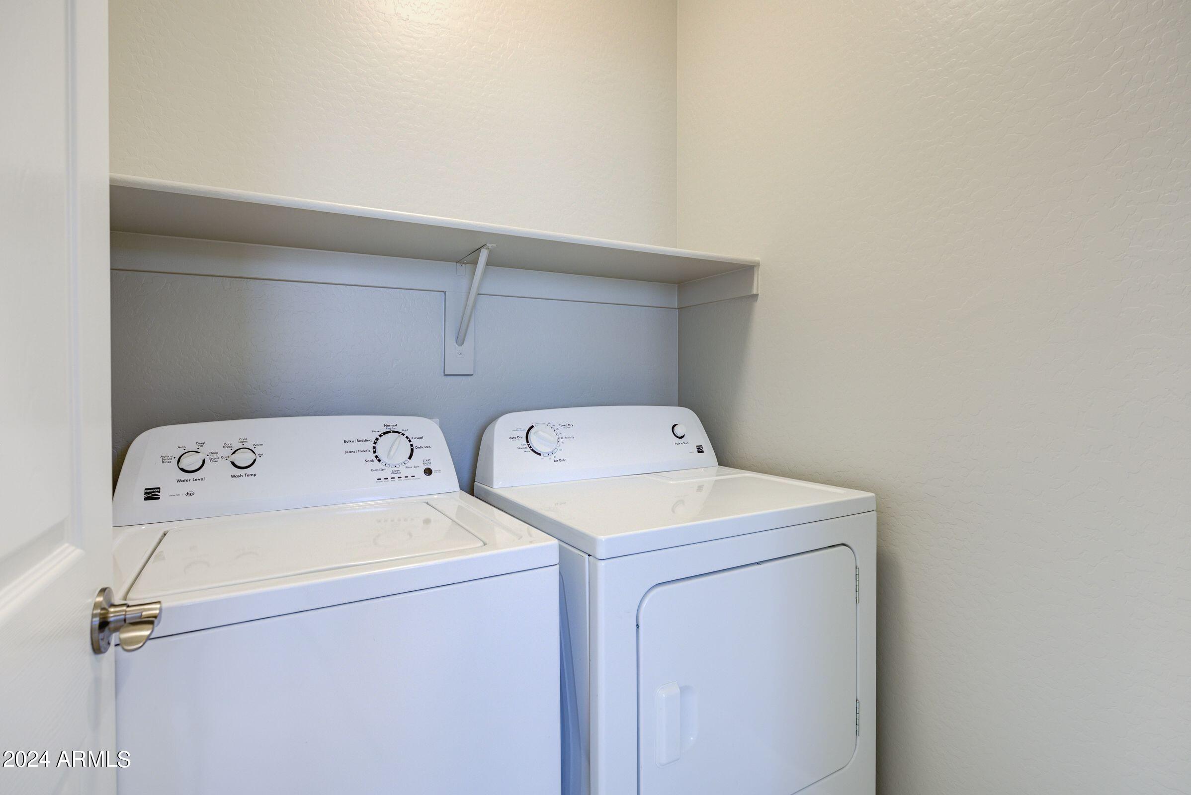 4777 South Fulton Ranch Boulevard, Unit 2066 Chandler, AZ 85248 - Photo 29 of 46 a utility room with dryer and washer