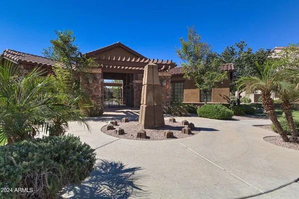 an empty room with a fireplace and shower