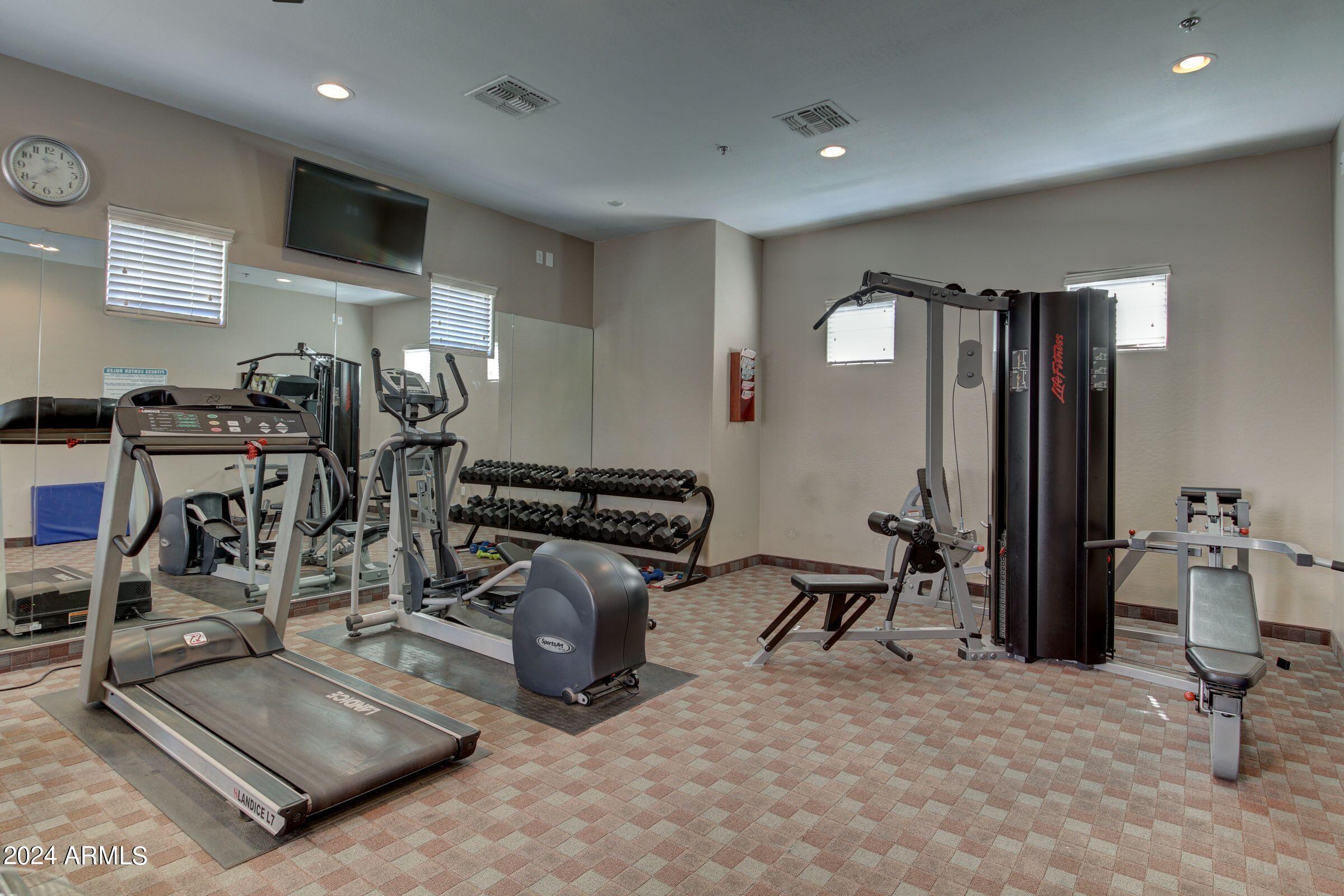 4777 South Fulton Ranch Boulevard, Unit 2066 Chandler, AZ 85248 - Photo 40 of 46 a view of a room with gym equipment