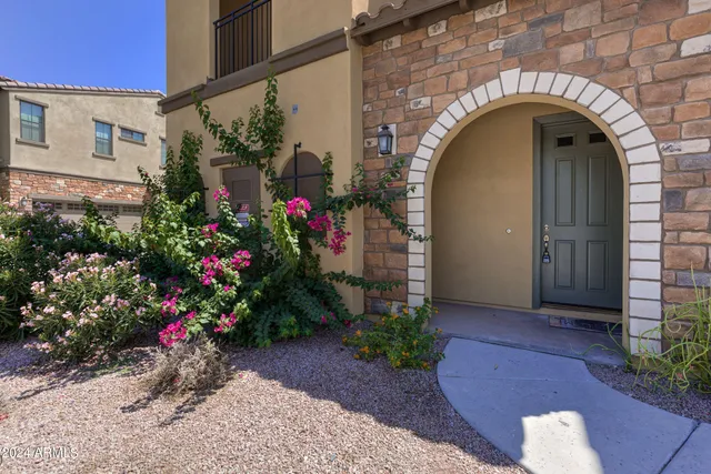 a view of entryway with flower pots