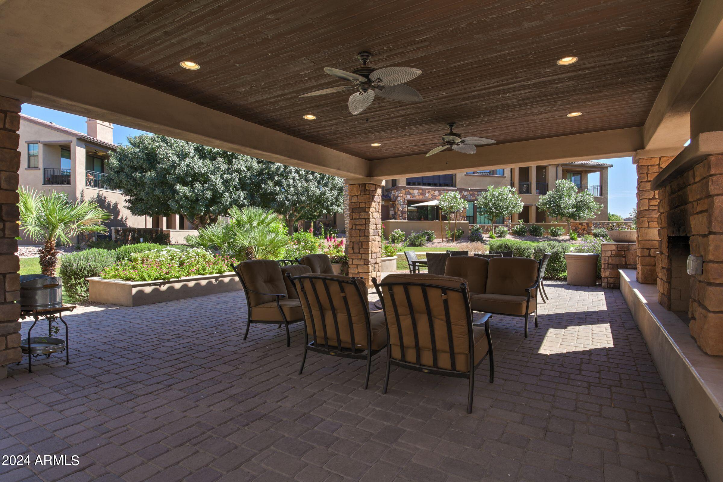 4777 South Fulton Ranch Boulevard, Unit 2066 Chandler, AZ 85248 - Photo 44 of 46 a view of a porch with furniture and a yard