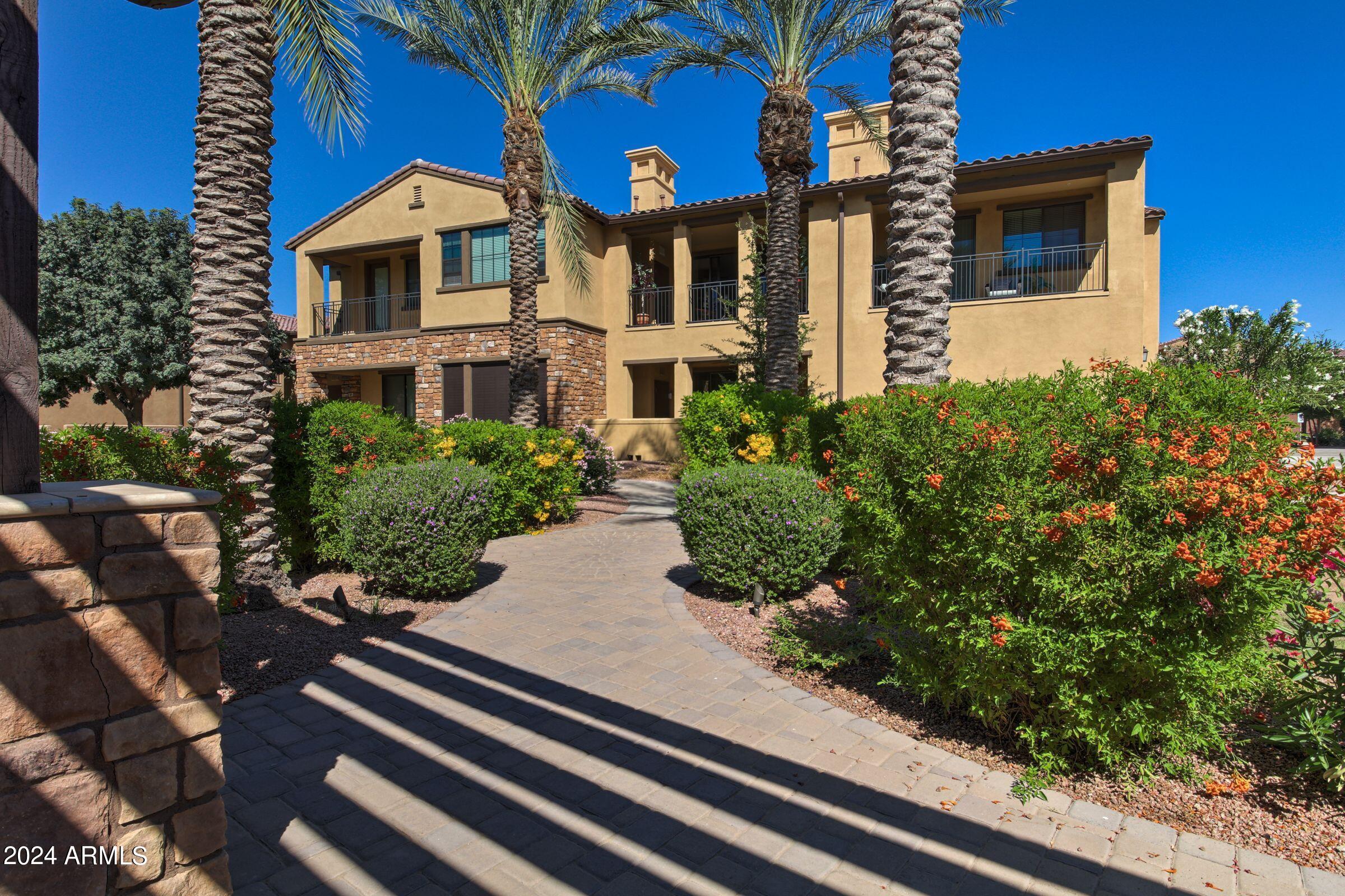 4777 South Fulton Ranch Boulevard, Unit 2066 Chandler, AZ 85248 - Photo 45 of 46 a front view of a house with garden