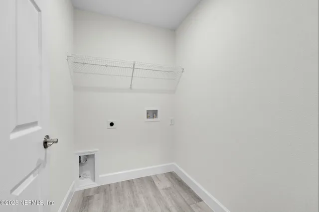 a view of a room with racks on the wall