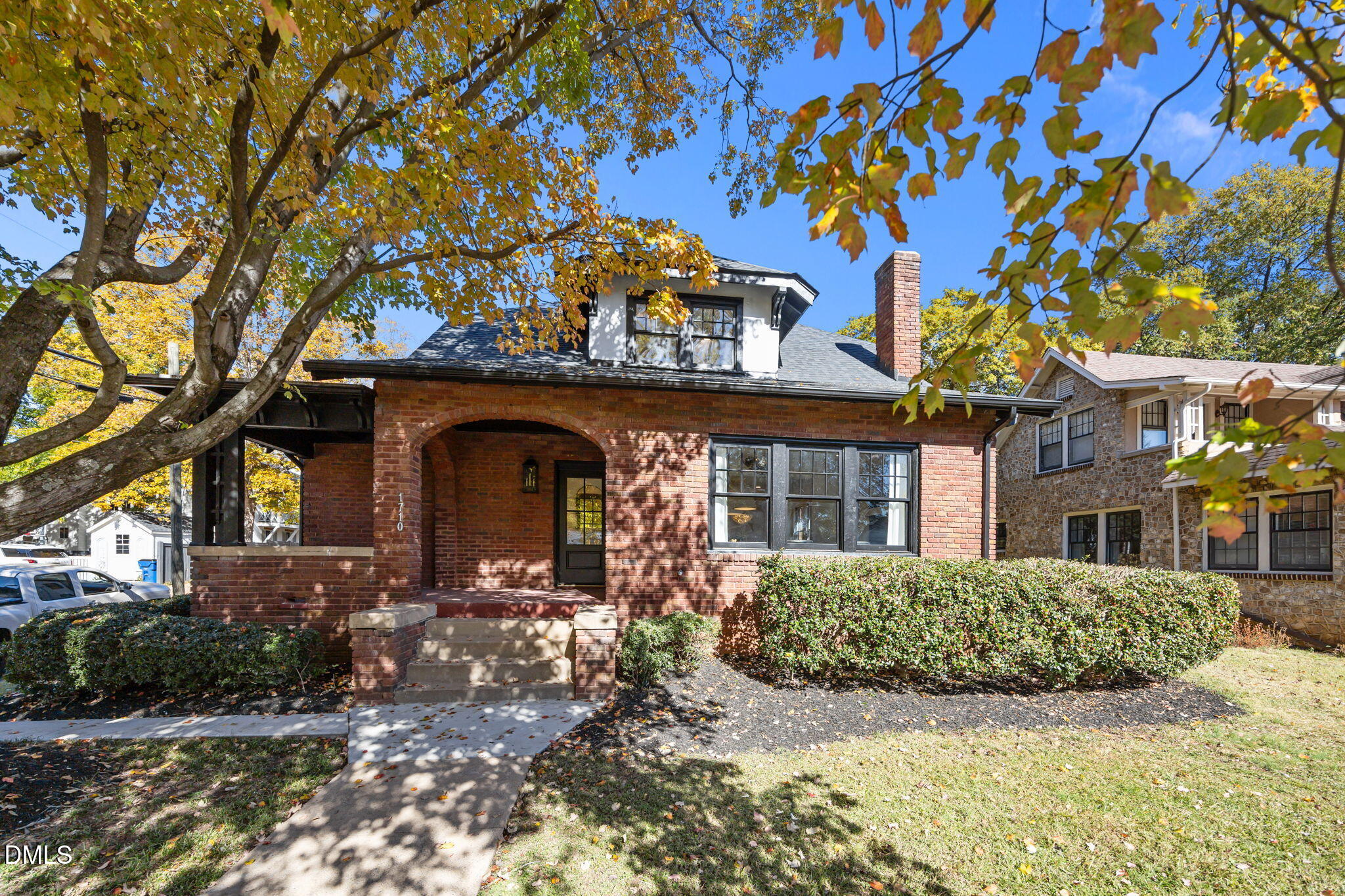 1710 Fairview Road Raleigh, NC 27608 - Photo 1 of 44 a front view of a house with a yard