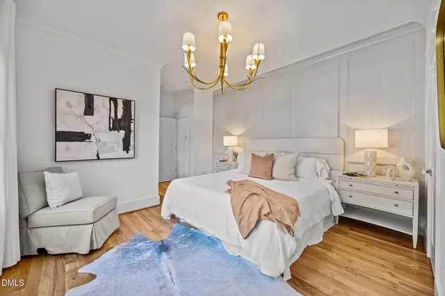 a bedroom with bed and a couch