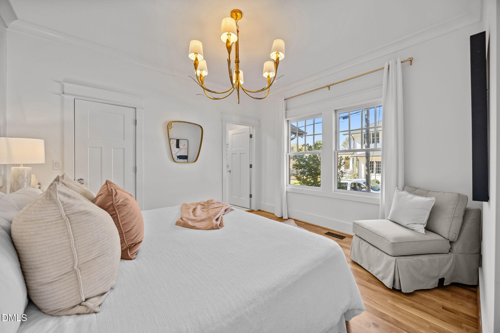 1710 Fairview Road Raleigh, NC 27608 - Photo 20 of 44 a bedroom with a bed and a couch