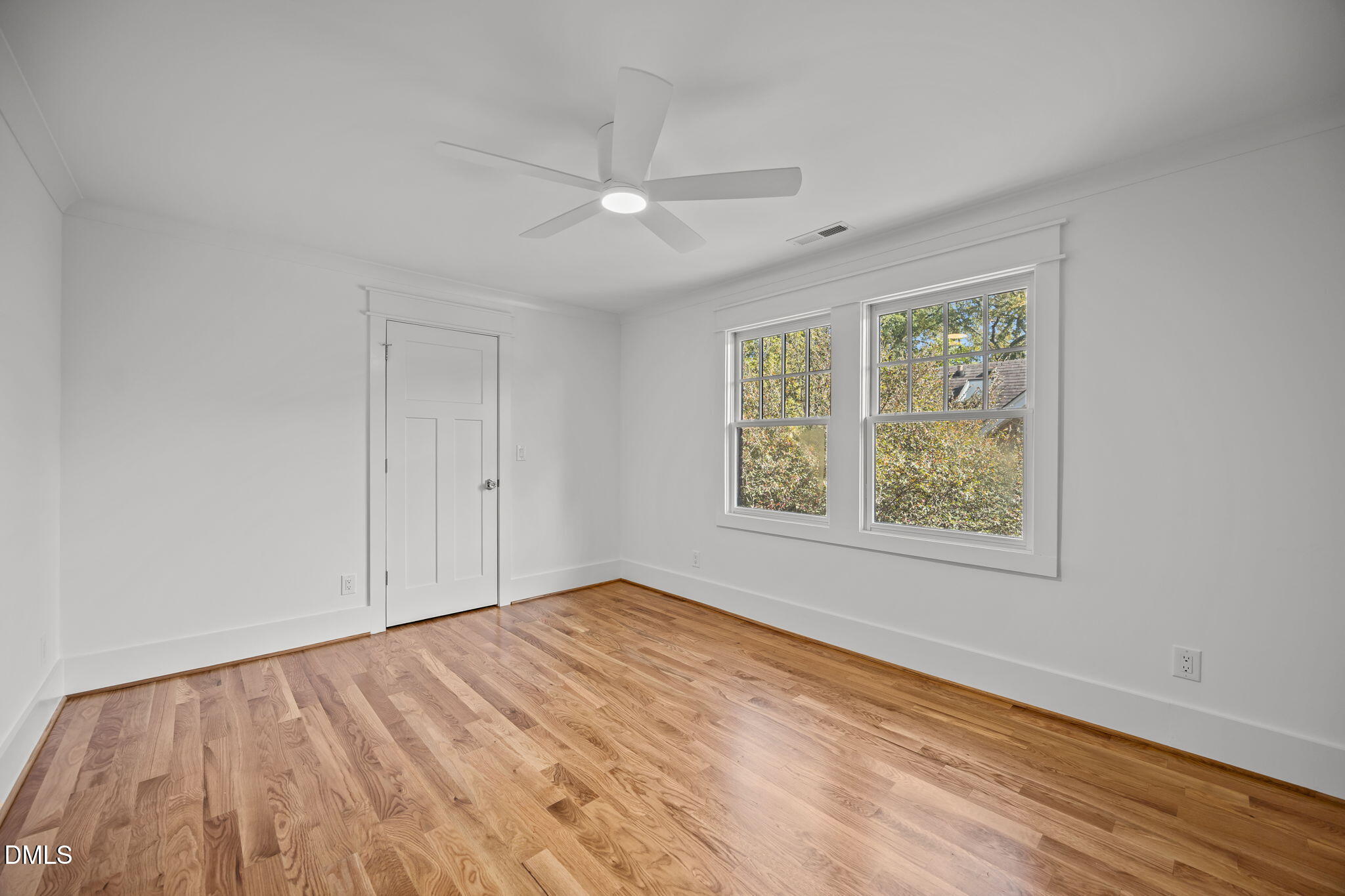 1710 Fairview Road Raleigh, NC 27608 - Photo 27 of 44 wooden floor in an empty room with a window