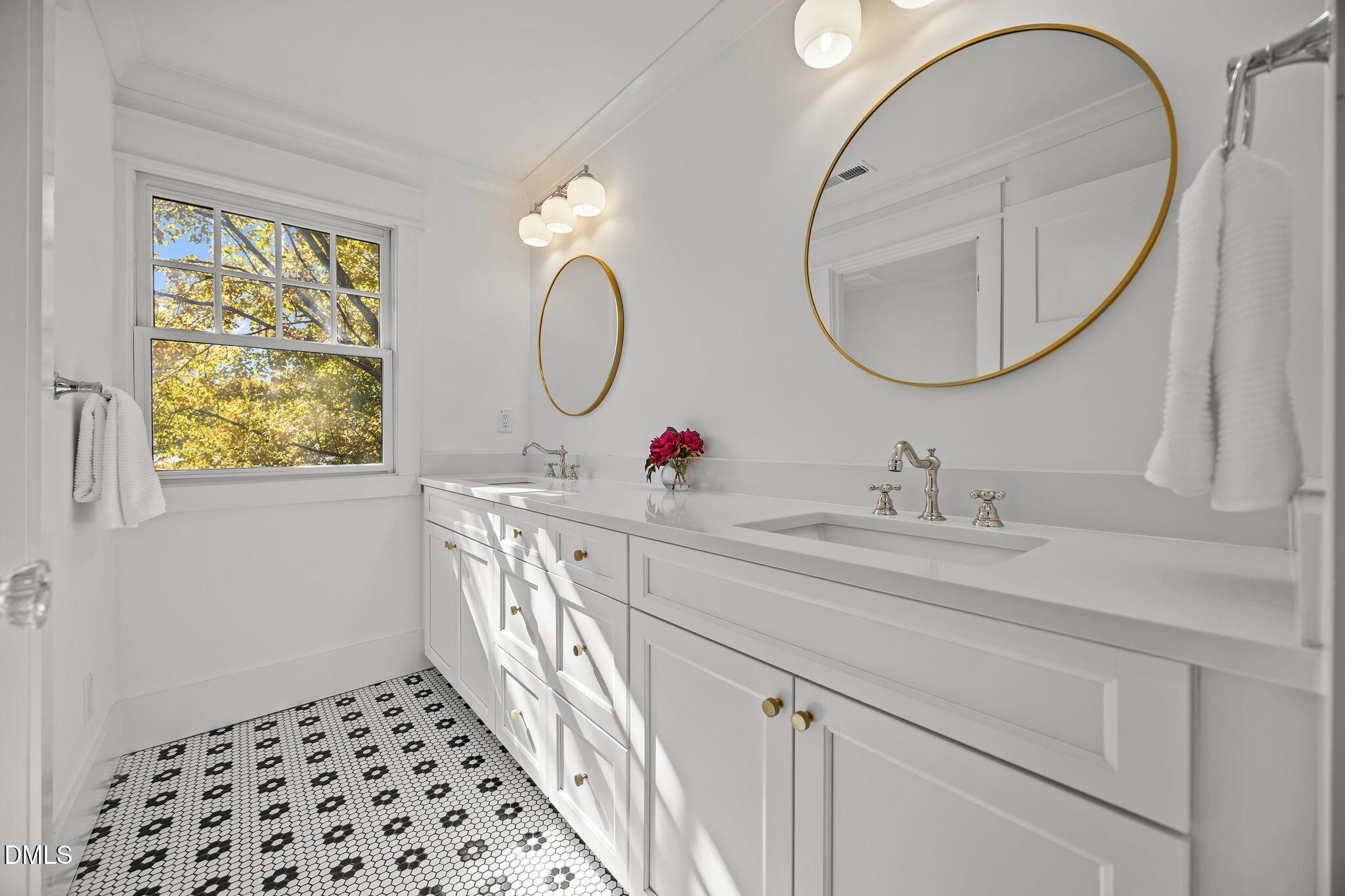 1710 Fairview Road Raleigh, NC 27608 - Photo 28 of 44 a bathroom with a sink and a mirror