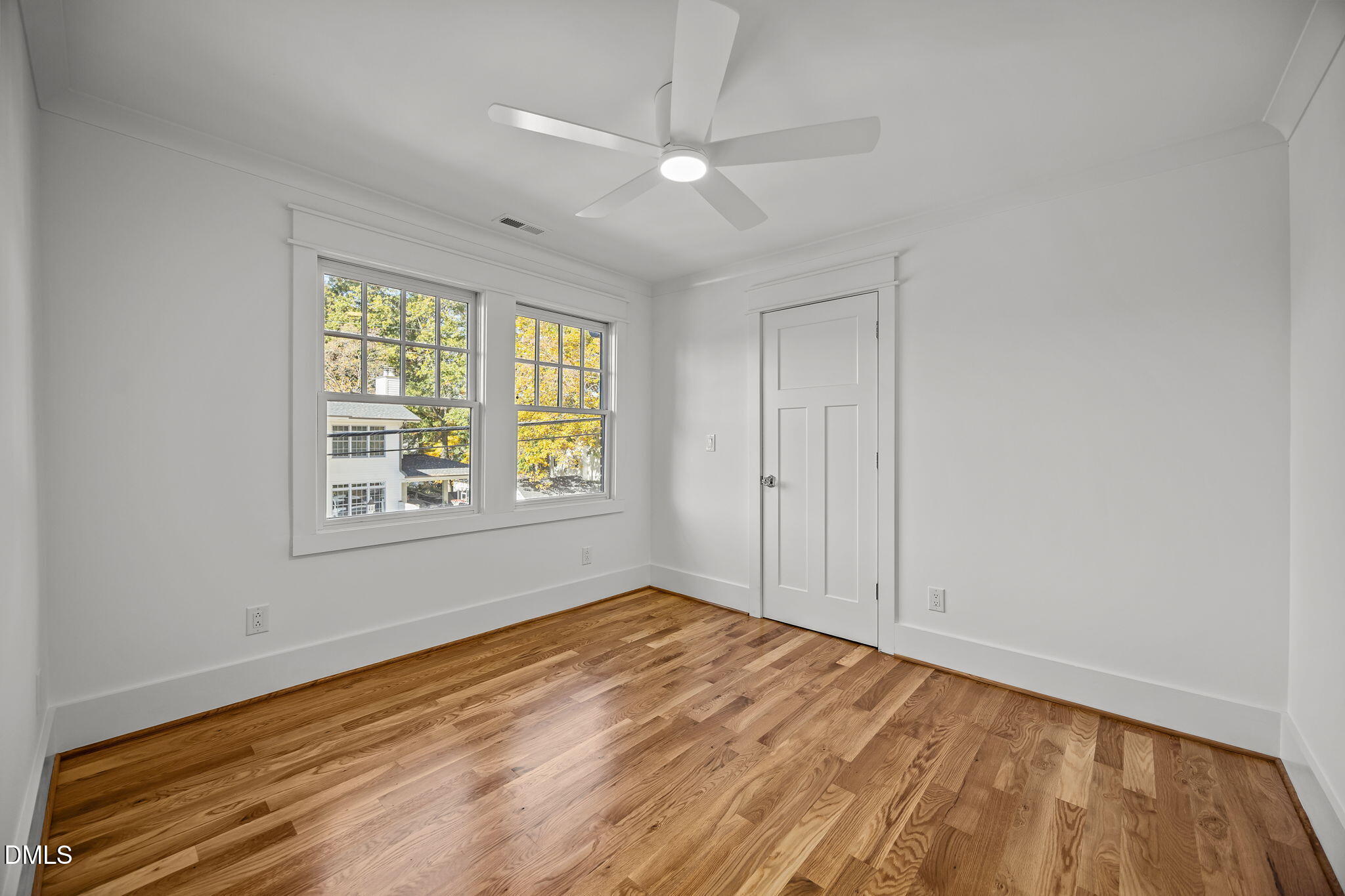 1710 Fairview Road Raleigh, NC 27608 - Photo 30 of 44 wooden floor in an empty room with a window