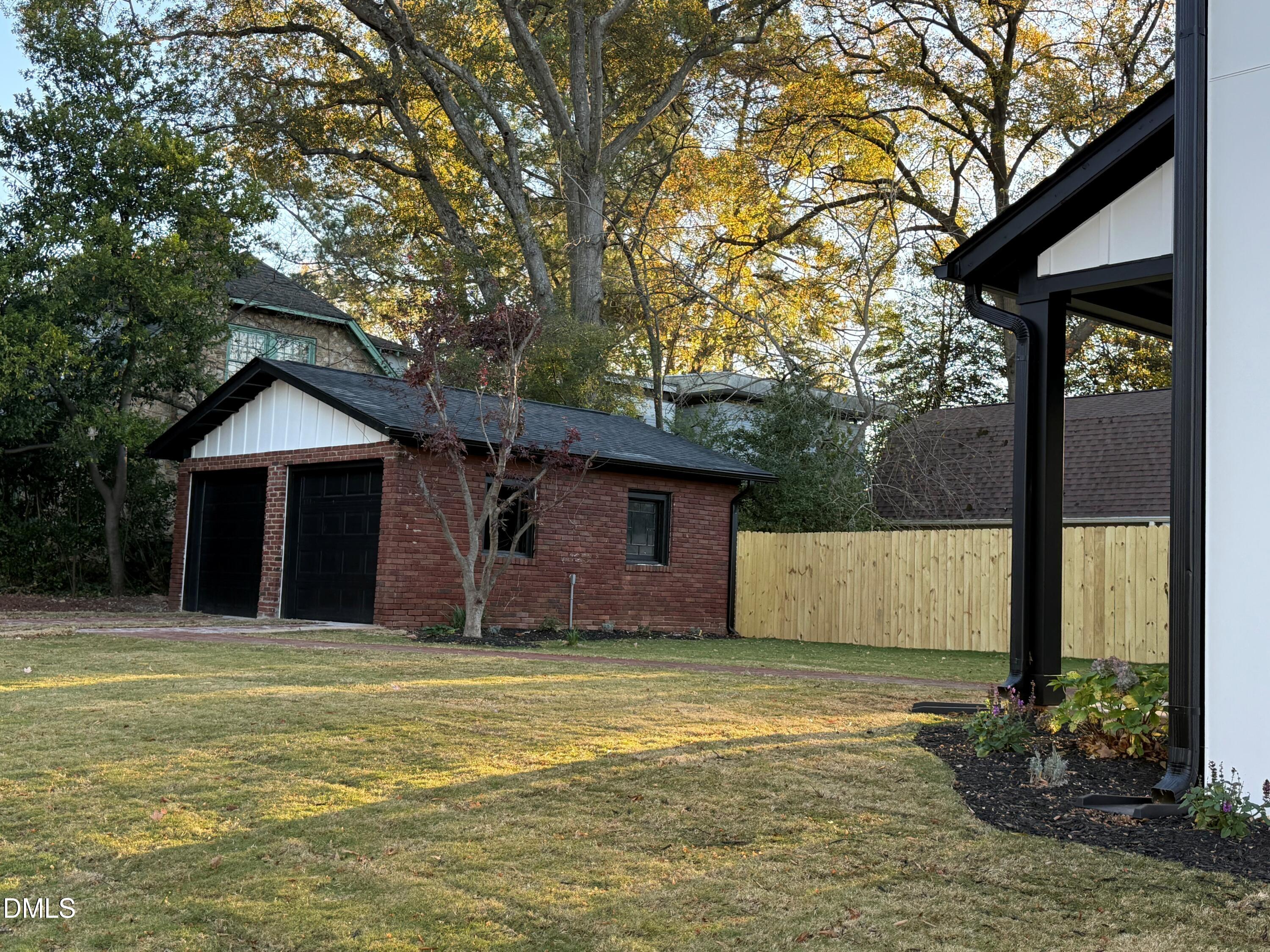 1710 Fairview Road Raleigh, NC 27608 - Photo 42 of 44 a house with trees in front of it
