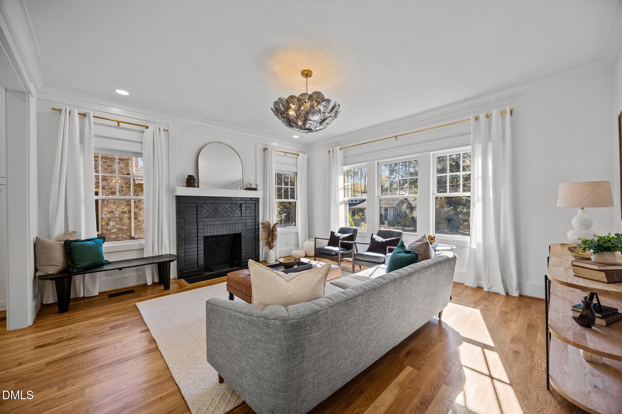 1710 Fairview Road Raleigh, NC 27608 - Photo 6 of 44 a living room with furniture and a fireplace